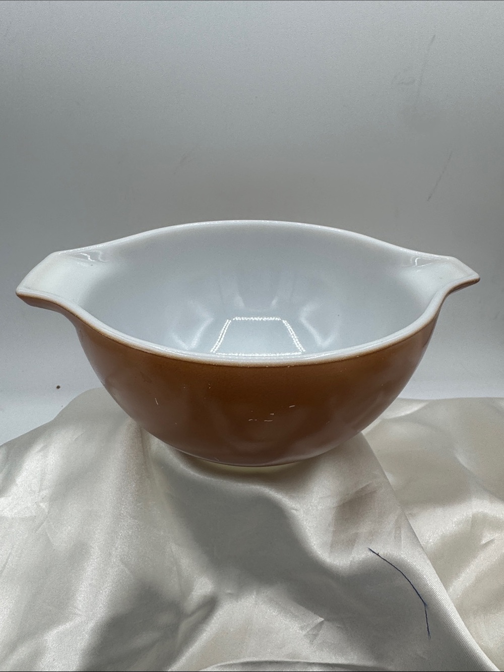 Pyrex Cinderella small mixing bowl #441; a solid brown exterior white interior